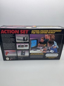 Nintendo NES Action Set Console Tested Working 2 controllers 1 gun
