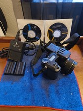 Konica Minolta DiMAGE A2 With Batteries, Charder And Memory Card Tested.