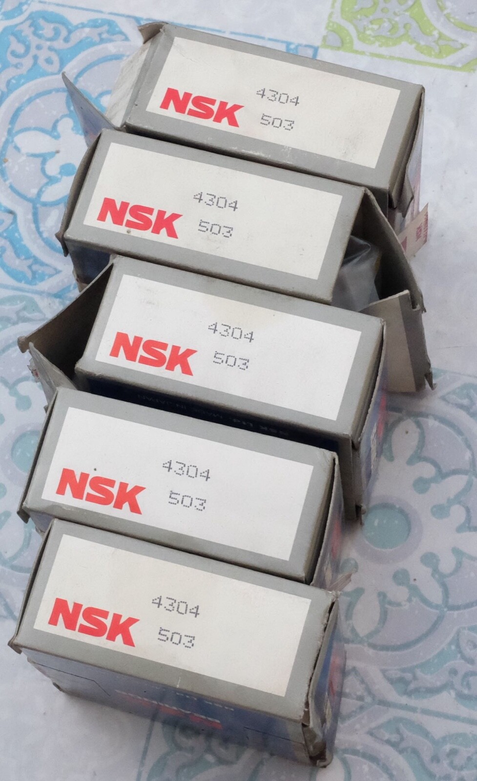 Roulement NSK 4304 rigide à billes 20x52x21mm contre les vibrations mécaniques axiales