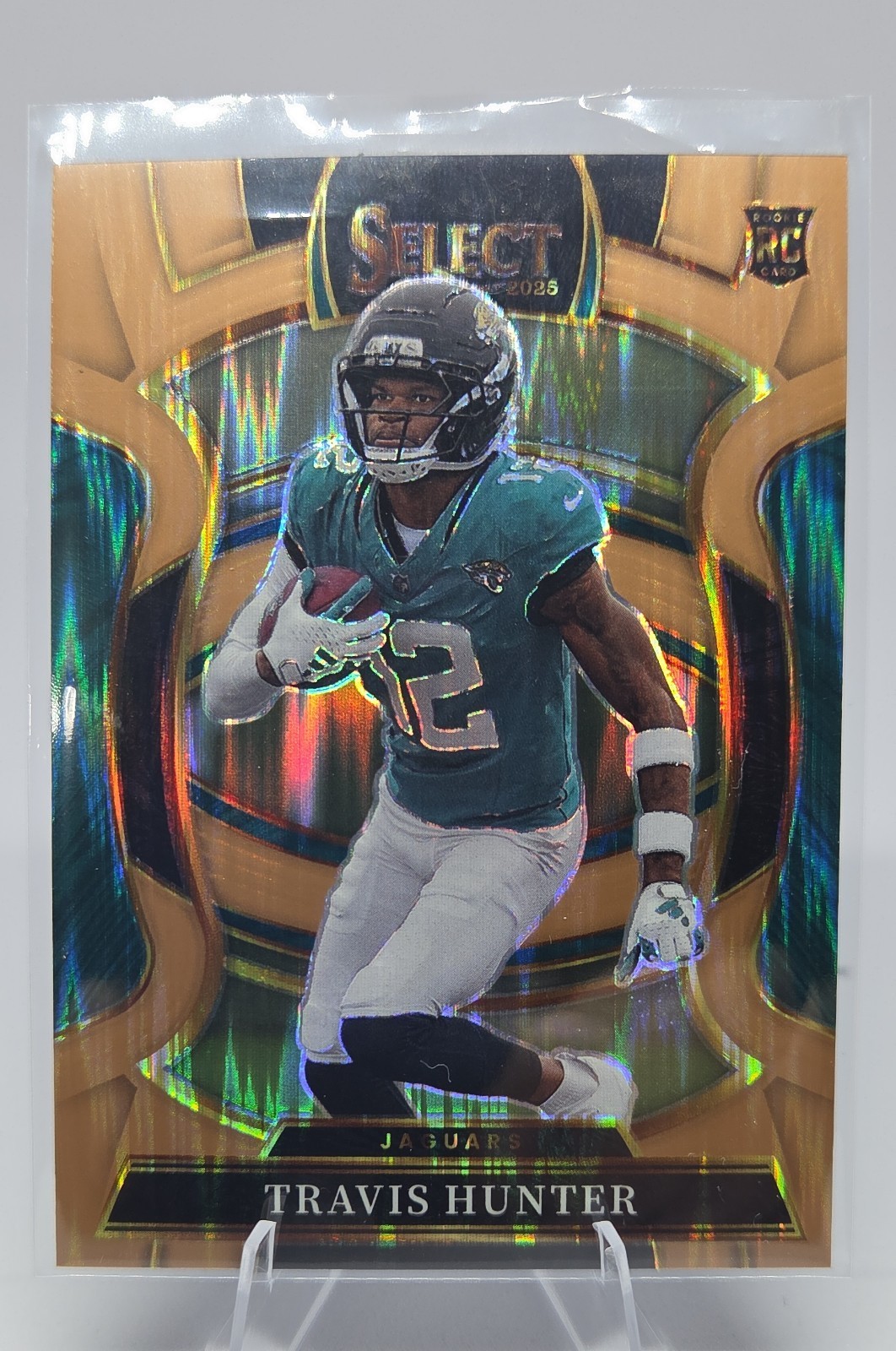 2025 Panini Select - Concourse Travis Hunter #28 Copper Shock Prizm /899 (RC)