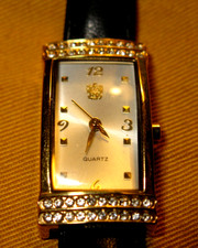 VTG. 8" LADIES' GOLD TONE PAOLO GUCCI WATCH W/ BLACK LEATHER BAND NEW BATTERY