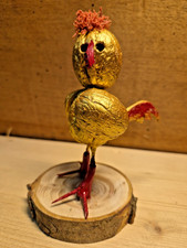 Goldfasan aus Walnussschalen.