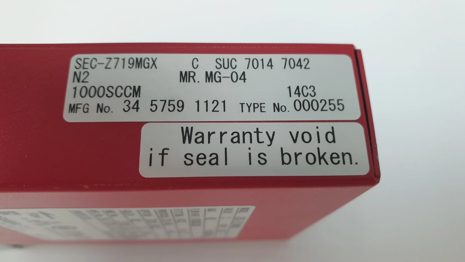 SEC-Z719MGX model label with MR. MG-04 and the tamper-seal sticker
