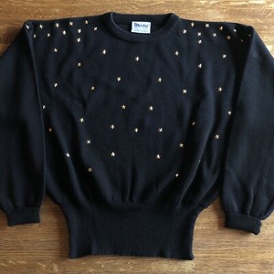 gold and black jumper