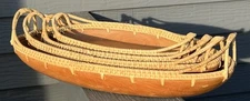 4 Oval Wooden Nesting Bowl with Woven Rattan Edges and Handles Canoe?