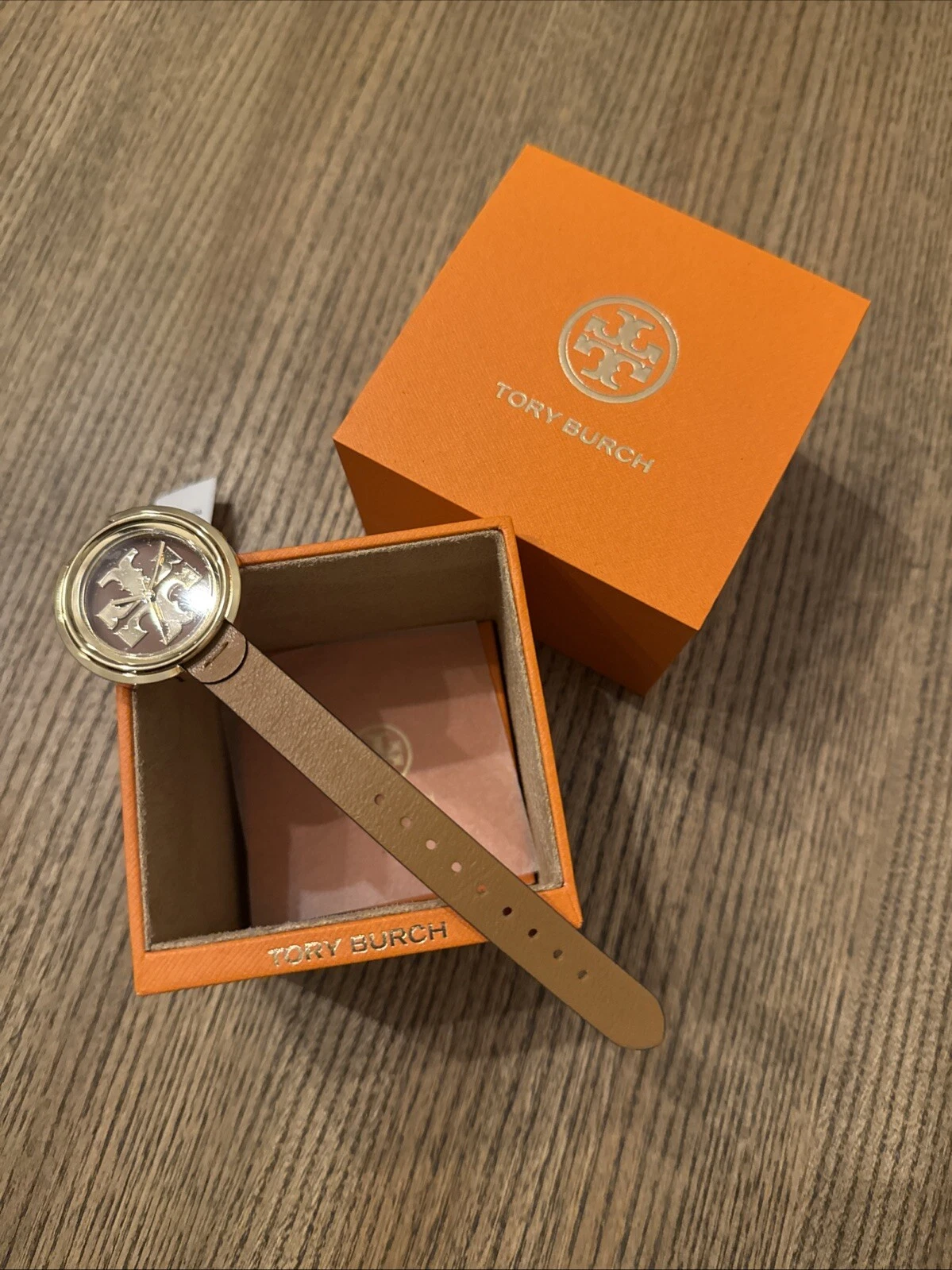 Orologio da donna Tory Burch oro e marrone bagagli pelle mugnaio TBW6201