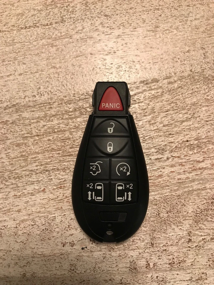 Llavero remoto Dodge Grand Caravan Fobik 7 botones FCC: IYZ-C01C, P/N: 56046709 Foto 3 de 3