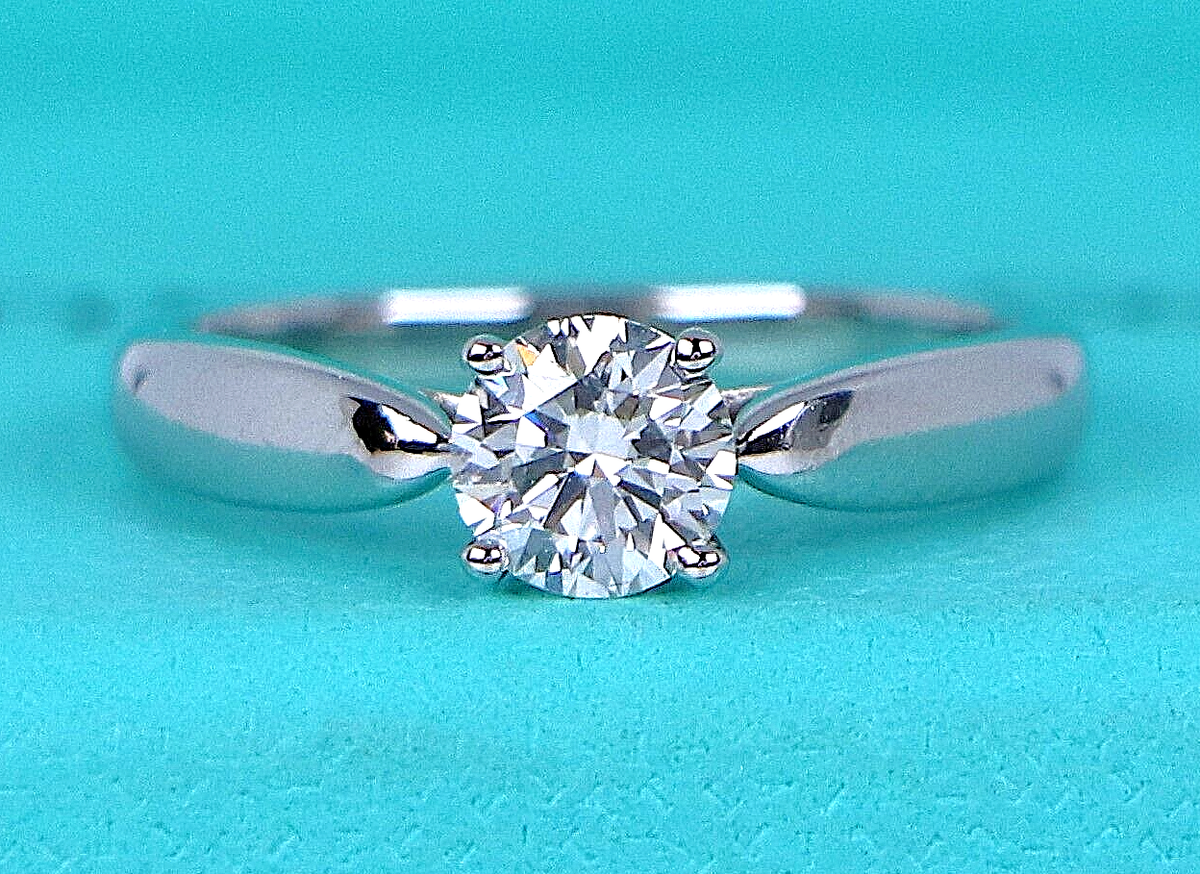 $6,400 Tiffany & Co Platinum Harmony H VS1 0.51ct Round Diamond