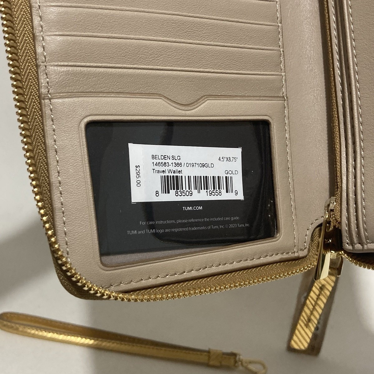 Tumi Belden Travel Leather Wallet Wristlet Strap Gold Metallic Zip