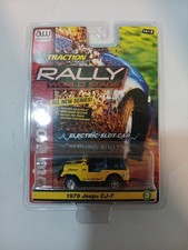 NEW - Auto World X-Traction Rally World 1979 Jeep CJ-7 HO Slot Car Yellow