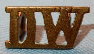 DW THE DUKE OF WELLINGTONS REGIMENT SHOULDER TITLE BADGE GENUINE COFFIN LUGS