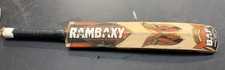 Raman cricket bat with "Rambaxy" branding and a black grip Peeling Stickers
