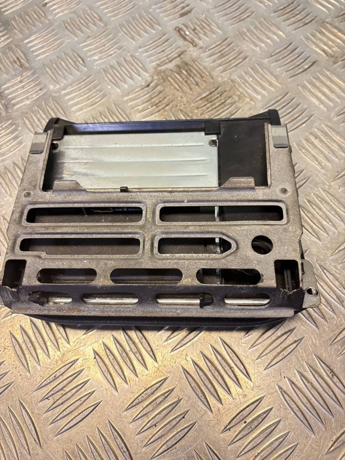 Actual Mercedes W201 ashtray assembly side view