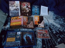 2 Blu-ray, 3 DVD, 1 NEW CD: Planet Terror, Dark Knight, To Live & Die in LA, 300