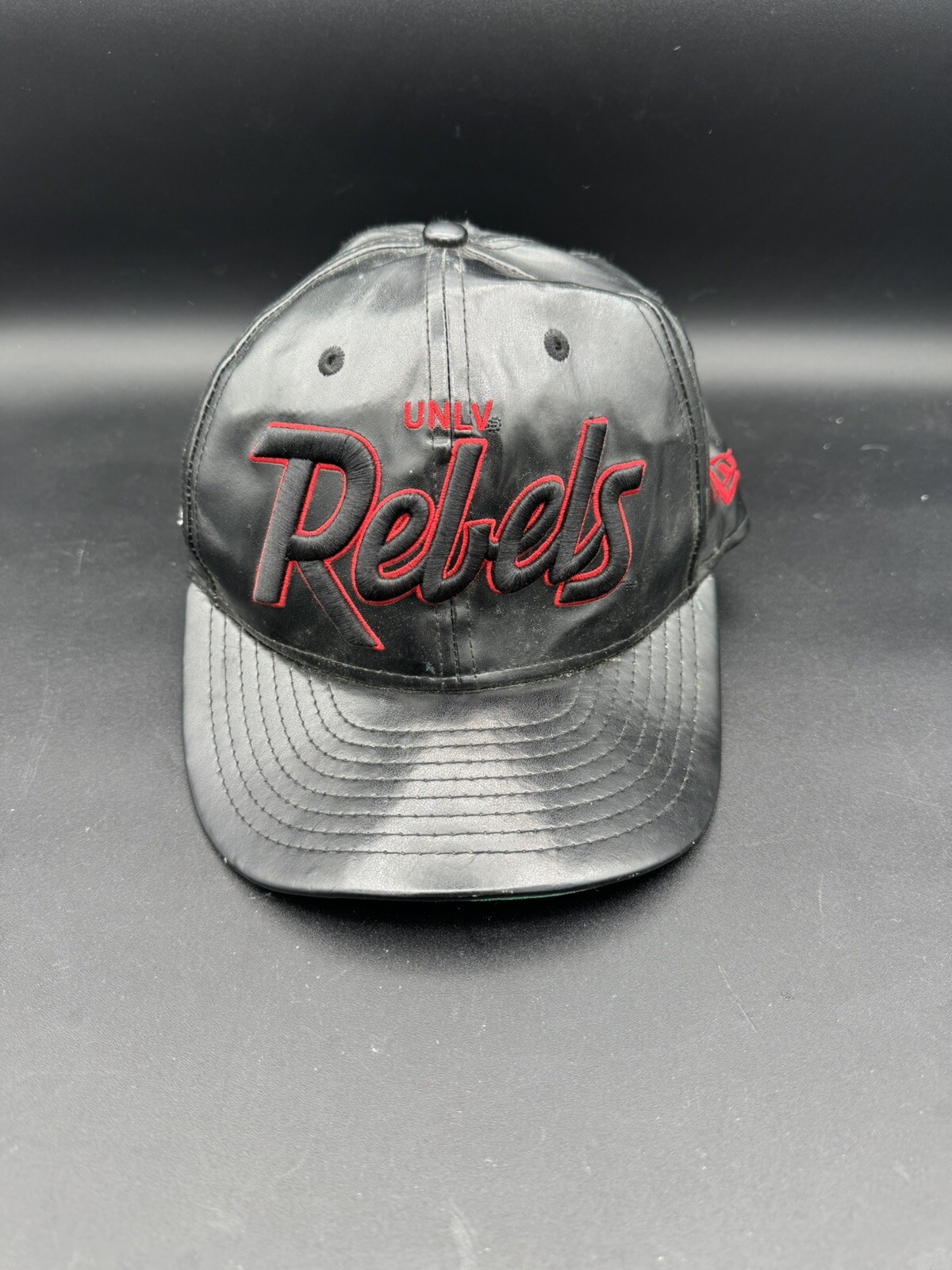 UNLV Rebels NCAA Basketball New Era Snapback Cap Hat Faux Leather Black