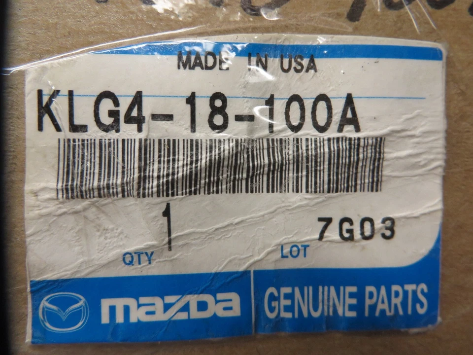 BOBINA DE ENCENDIDO ORIGINAL MAZDA OEM # KLG4-18-100A NUEVA PIEZA FORD # F82U-12029-AA Foto 4 de 4