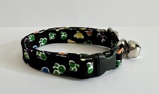 COLORFUL PAW PRINTS ON BLACK PRINT ADJUSTABLE BREAKAWAY CAT COLLAR
