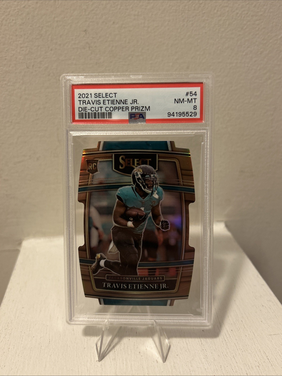 2021 Panini Select - Concourse Travis Etienne #54 Copper Prizm Die-Cut /199 (RC)