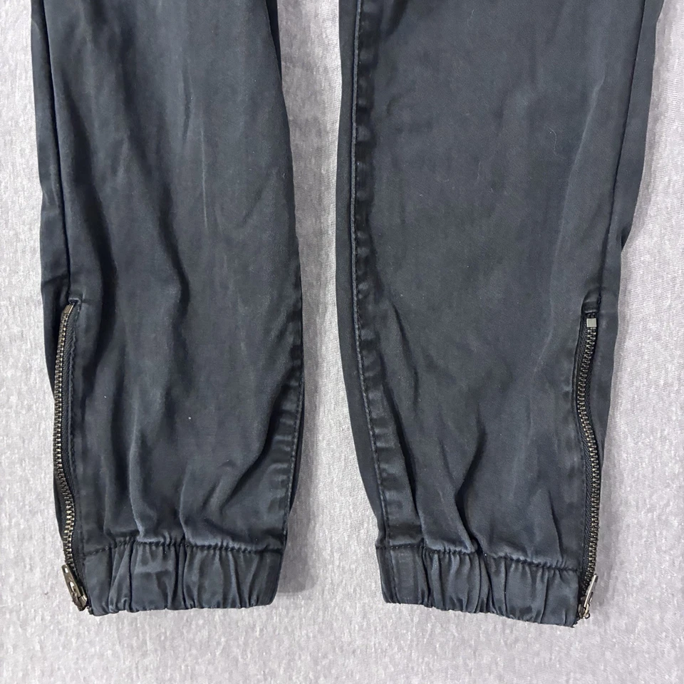 Pantalones elásticos American Eagle para mujer talla 4 negros con cremallera al tobillo usados en excelente estado Foto 2 de 4