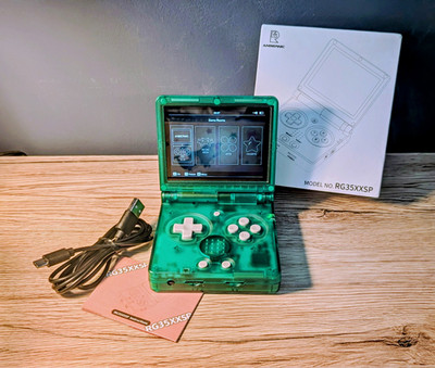 Anbernic RG35XXSP Flip (Transparent Green) | Like New | 64GB Card with stock OS