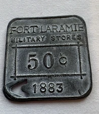 RARE 50 CENTS MILITARY STORES PAYMENT TOKEN FORT LARAMIE 1883 WITH PUNCH HOLE