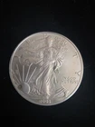 2003 Silver American Eagle BU Condition- Has 2 Spots - Nice Coin .999 Silver
