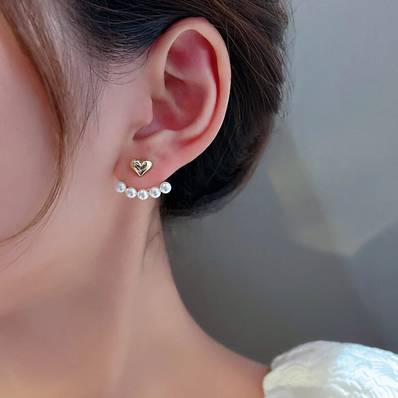 Heart shaped silver earrings outlet