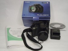 Canon PowerShot SX40 HS Black 12.1MP + Battery Charger 4 GB SD and more