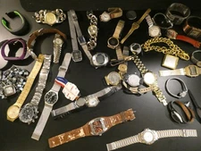Lot of watches  Variety of styles, shapes, and brands.  For parts/ some may work