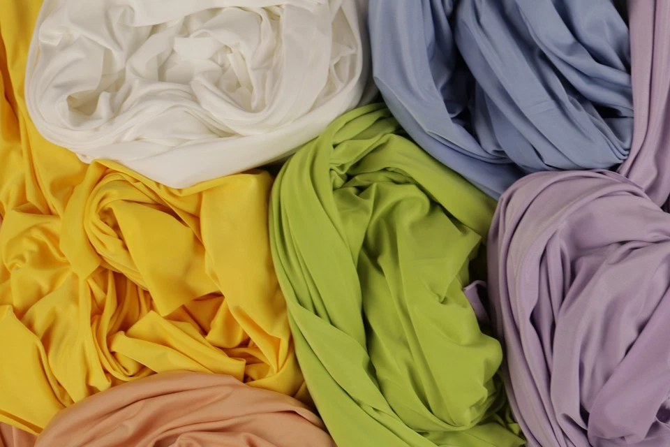 Tela tejida jersey elástica venechia 47 colores por yarda 60" de ancho Foto 4 de 4