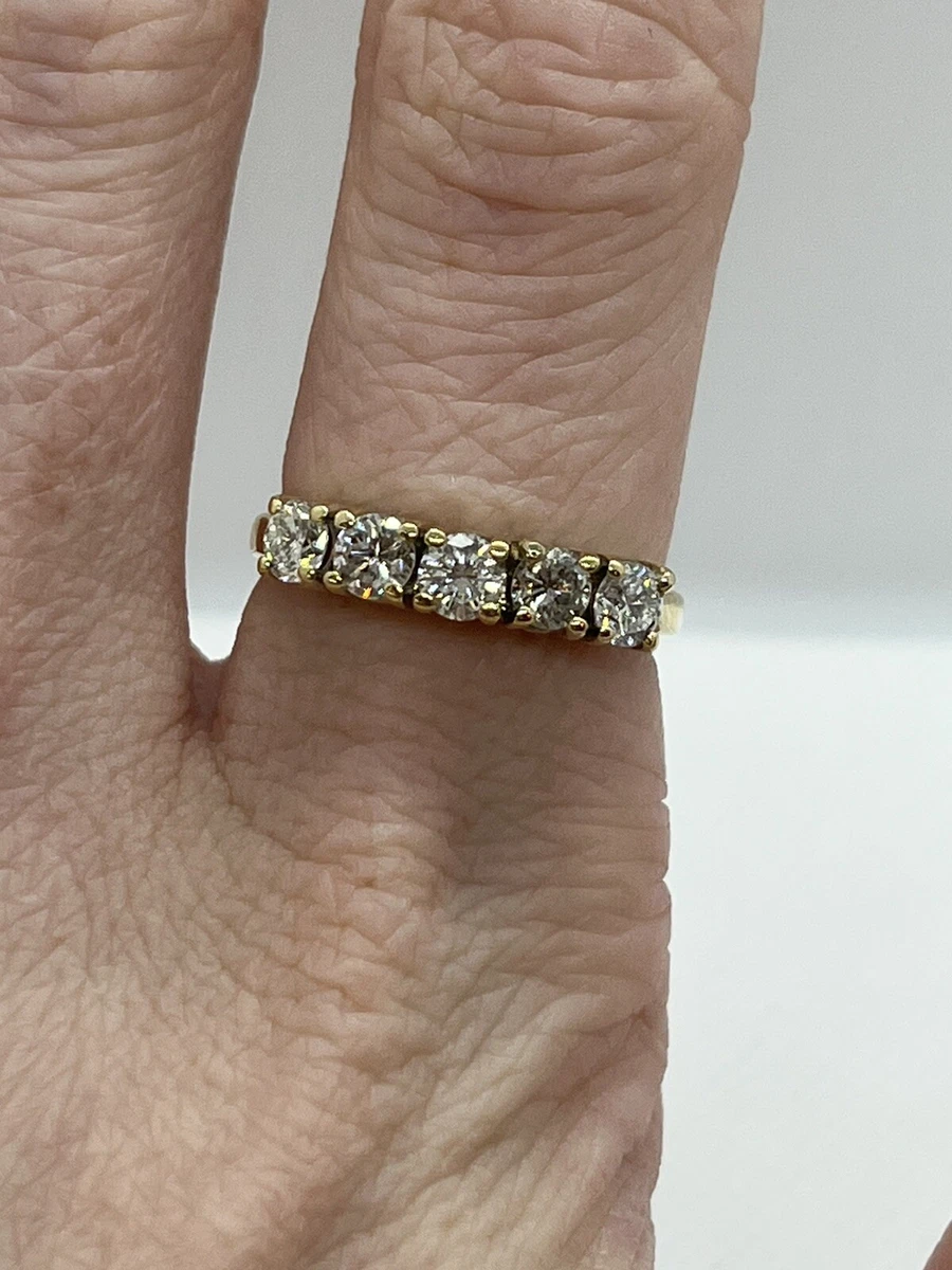 Five stone diamond store eternity ring