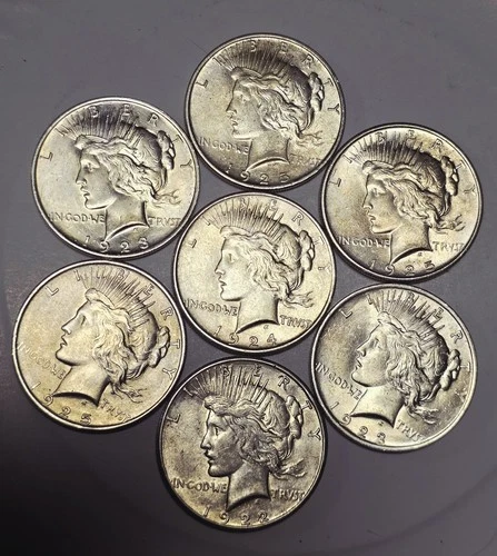 .99Cents!! Group of 7x 1923 $1 Silver Peace Dollars - All BU
