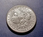 AU 1883-S Morgan Dollar