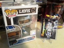 2025 Panini Luminance, Unforgettable Amon-Ra St. Brown #7 W/ Funko Pop #254