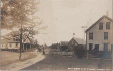 West Epping NH Looking North Railroad Train Station Store 1913 RPPC Postcard
