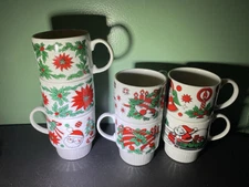 Vintage Kitsch Christmas Stacking Mugs Cups Holiday Set of 7 Santa Reindeer Etc.