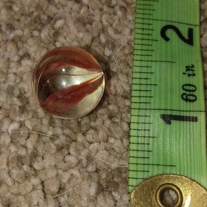 Clear Glass Toy Marble with Orange Swirl Pattern Machine Made - Single Marble