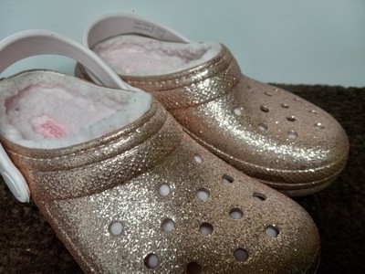gold glitter crocs with fur