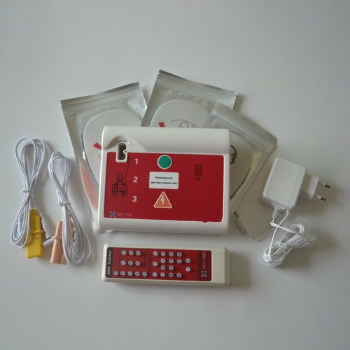 1pz XFT-120C AED Trainer Dispositivo per Pronto Soccorso CPR Training in Inglese e Tedesco - Foto 3 di 7