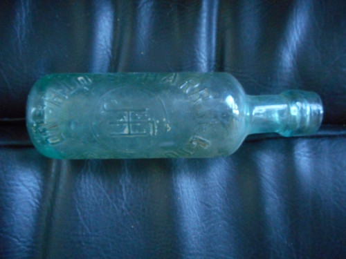 Vintage Glass embossed bottle used