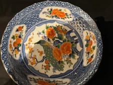 large multi colored vintage bowl, lobbed rim, paradise bird and flowers, marked