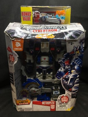 NIB Transformers Cybertron Primus Unleashed METROPLEX Action Figure W/ Bonus