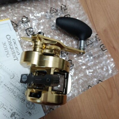 Shimano Ocea Conquest 301PG Baitcasting Fhishing Reel Gold Unused