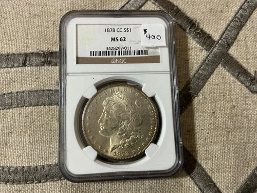 1878-CC NGC MS-62 Morgan Silver Dollar 90%.