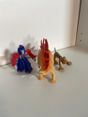 OPTIMUS PRIME (BK KIDS MEAL), Stegosaurus, (1985 IMPERIAL?), TIGER (SIMBA TOYS?