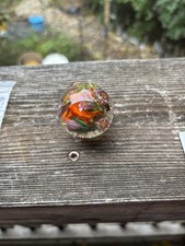 handmade art glass marble  orange Core  By Sara Sally LaGrand