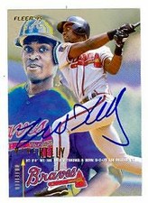Mike Kelly autographed baseball card (Atlanta Braves) 1995 Fleer #306