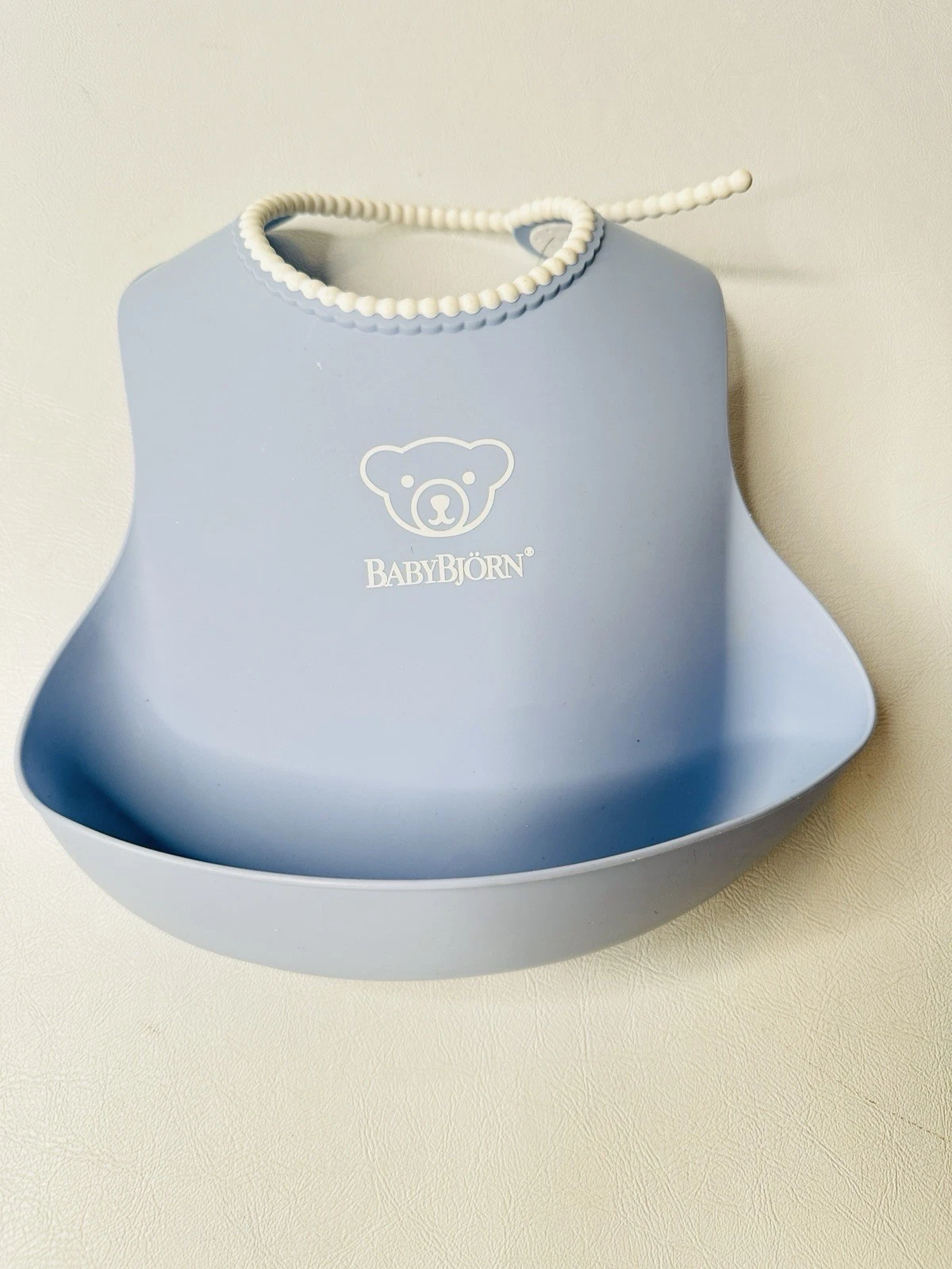 BabyBjörn Soft Plastic Bib Blue Adjustable Neck Baby Feeding Bib Made in Sweden