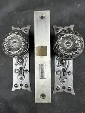 Russell and Erwin 1887 Flemish Pattern Doorknobs and Backplates set F-20400