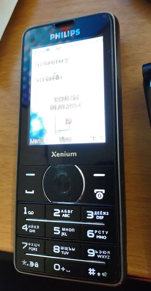 Teléfono celular Philips Xenium X1560 2MP FM 100 días doble SIM en espera 2G GSM funcionando Foto 4 de 4